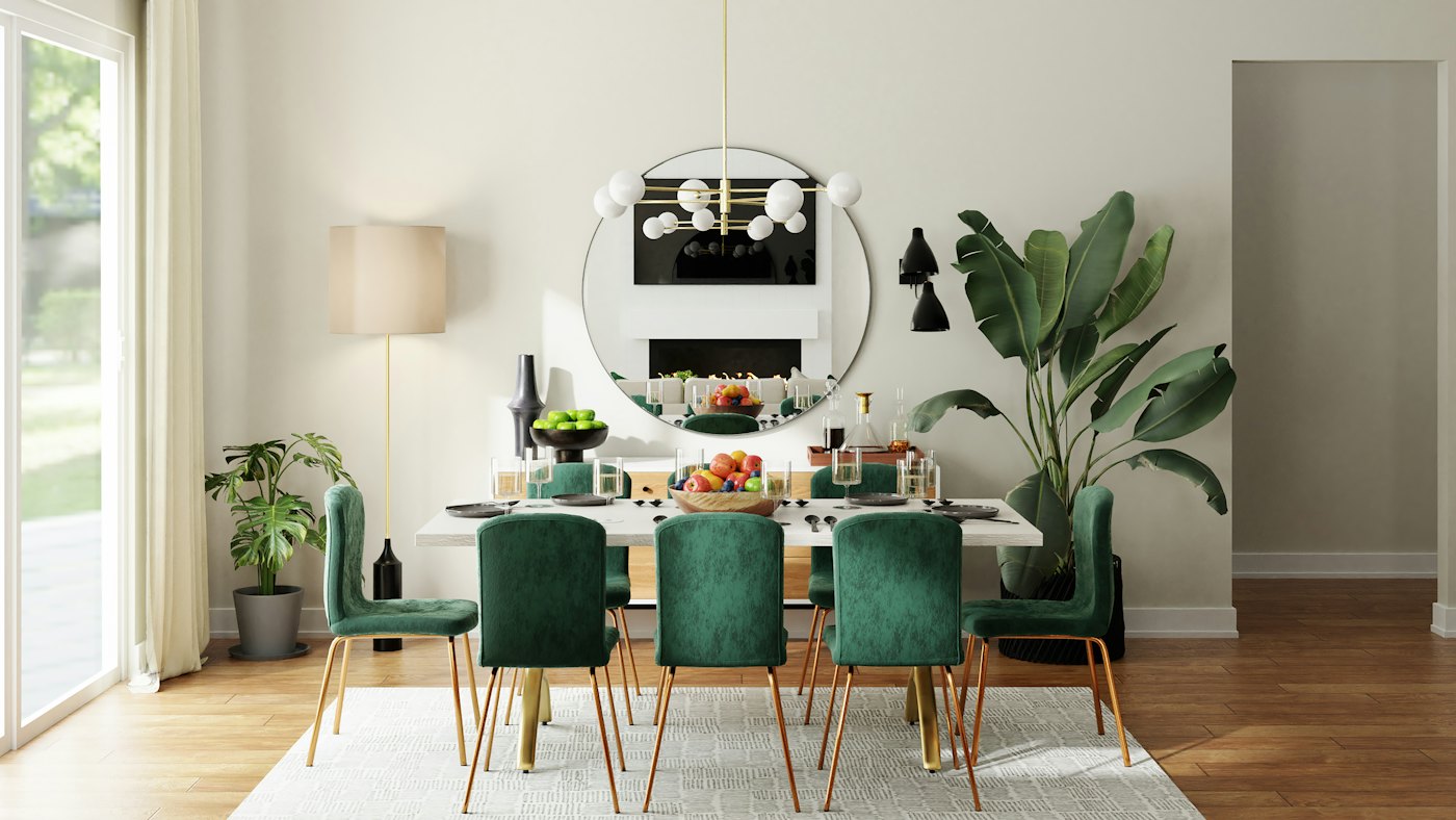 Dining room with green chairs and soft neutral walls