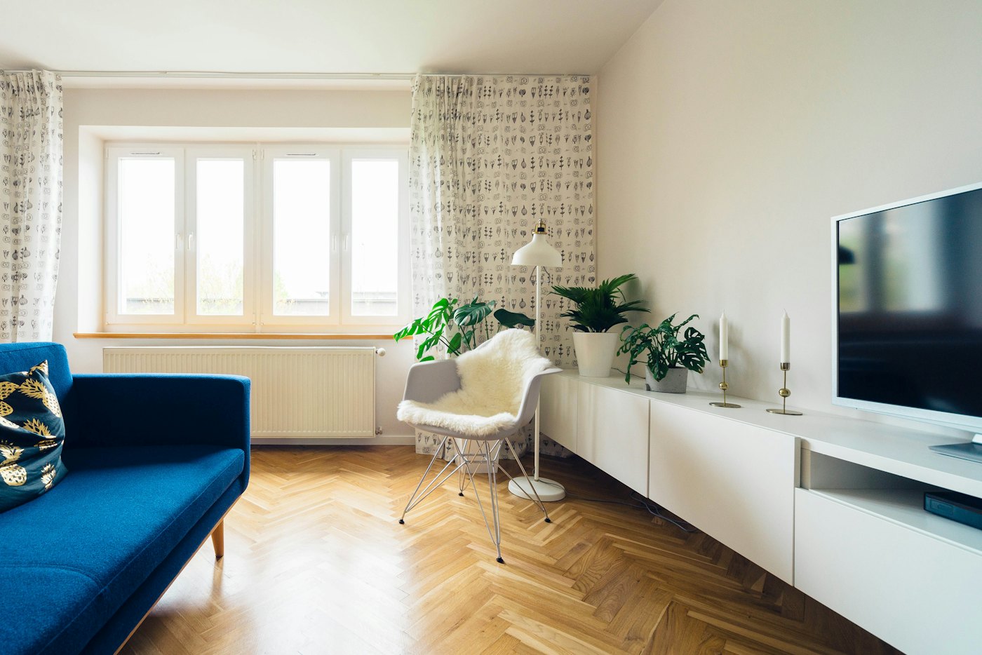 Living room with a deep blue sofa